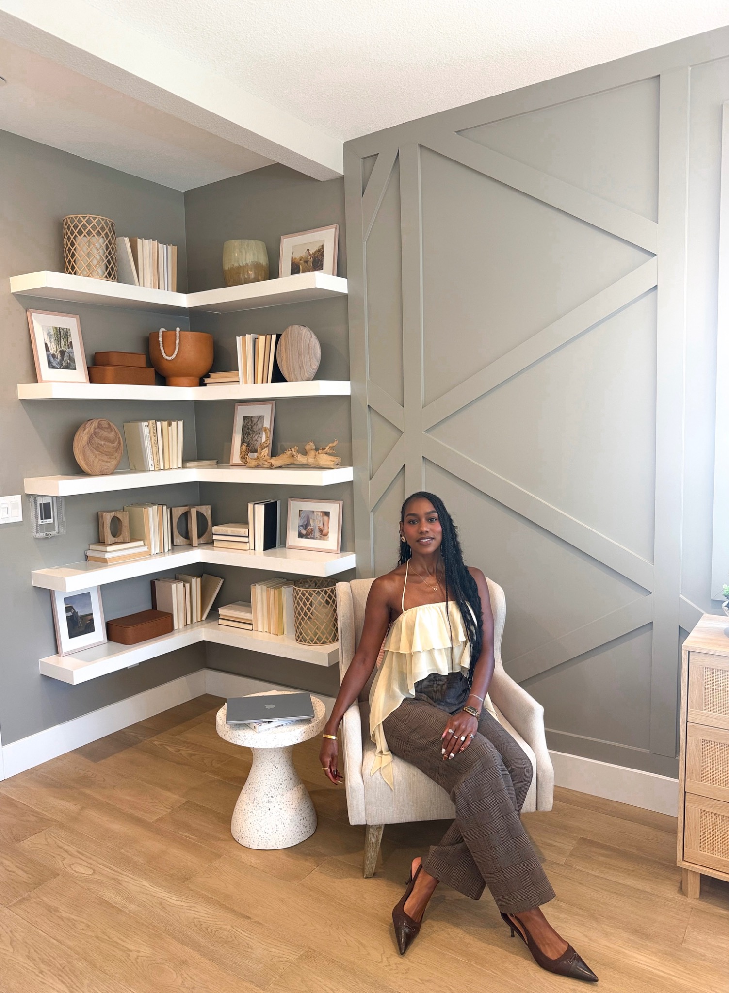 Makala Lee-Norwood seated in a thoughtfully styled interior